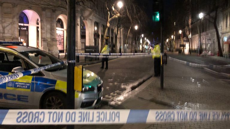 A police cordon in Westminster after a man brandishing knives was shot dead by police