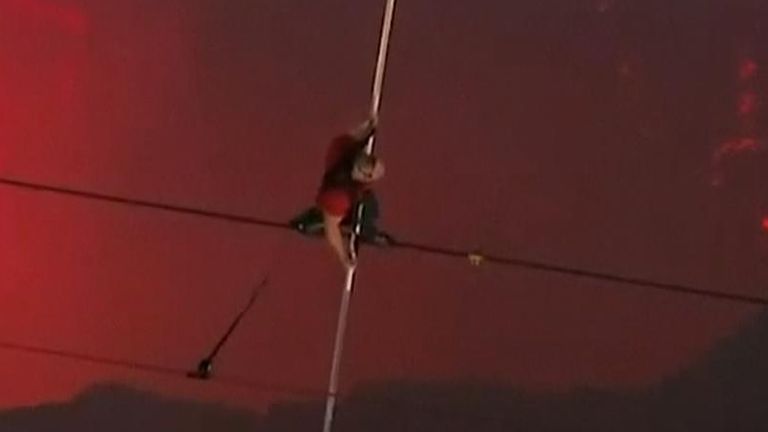 Man walks tightrope over active volcano