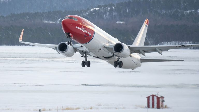 A Norwegian Air Boeing 737-800 plane takes off at Alta Airport in Finnmark county on February 17, 2019 in Alta, Norway