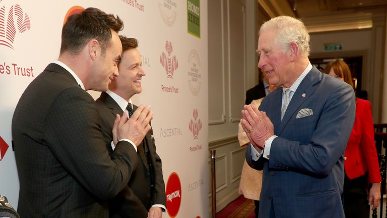 The Prince of Wales uses a Namaste gesture to greet television presenters Ant McPartlin (left)and Declan Donnelly as he arrives at the annual Prince&#39;s Trust Awards 2020 held at the London Palladium. PA Photo. Picture date: Wednesday March 11, 2020. See PA story ROYAL Trust. Photo credit should read: Yui Mok/PA Wire