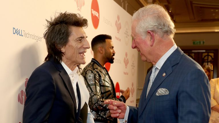 The Prince of Wales speaks with Rolling Stone Ronnie Wood as he arrives at the annual Prince&#39;s Trust Awards 2020 held at the London Palladium.