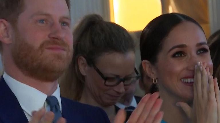 The Duke and Duchess of Sussex watch as man proposes to girlfriend on stage at event in London