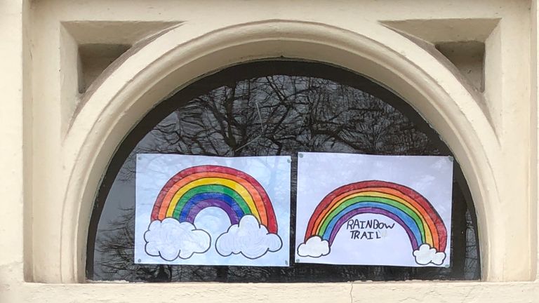 Children stick rainbow drawings in their windows to boost ...