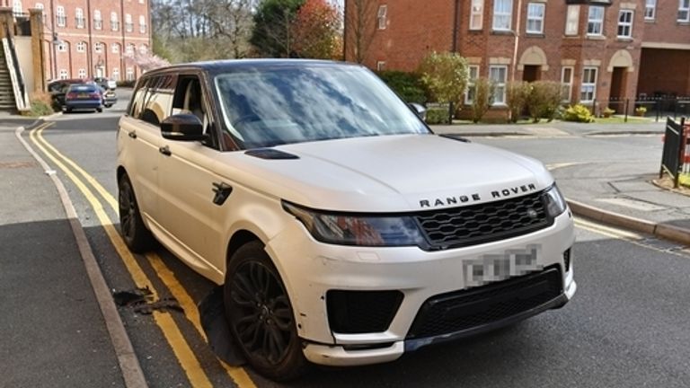 A damaged white Range Rover after reports of a crash in Solihull