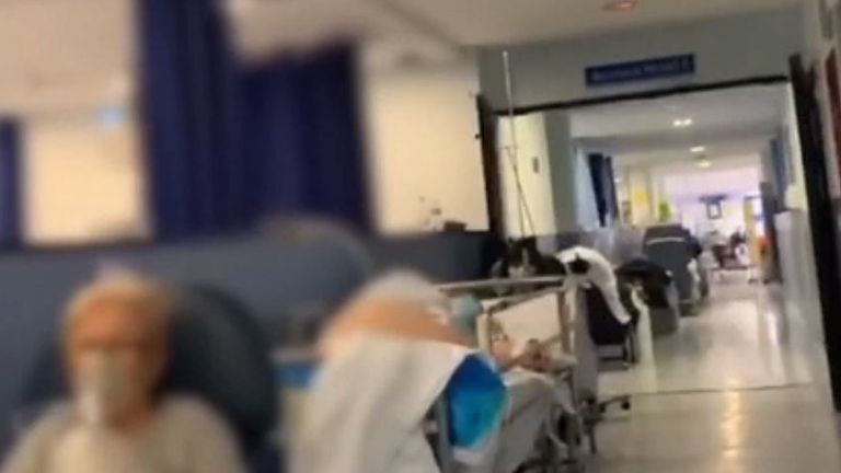 Images from Spain appear to show patients lined-up in hospital corridors 
