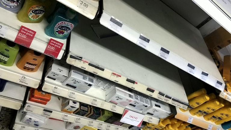 Empty shelves of hygiene products at a supermarket in Birmingham