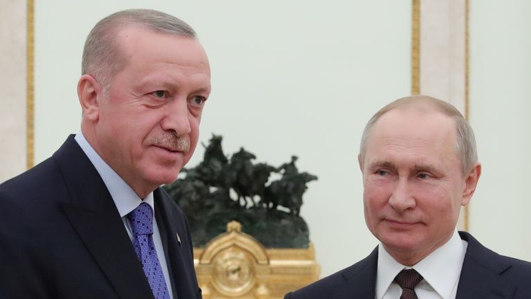 Russian President Vladimir Putin and Turkish President Tayyip Erdogan pose for a photo during a meeting in Moscow
