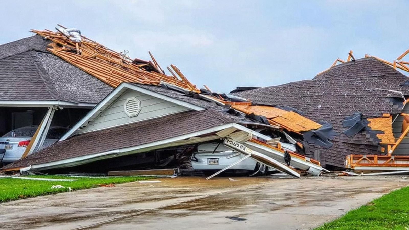 Tornadoes kill at least 30 people and damage hundreds of homes in