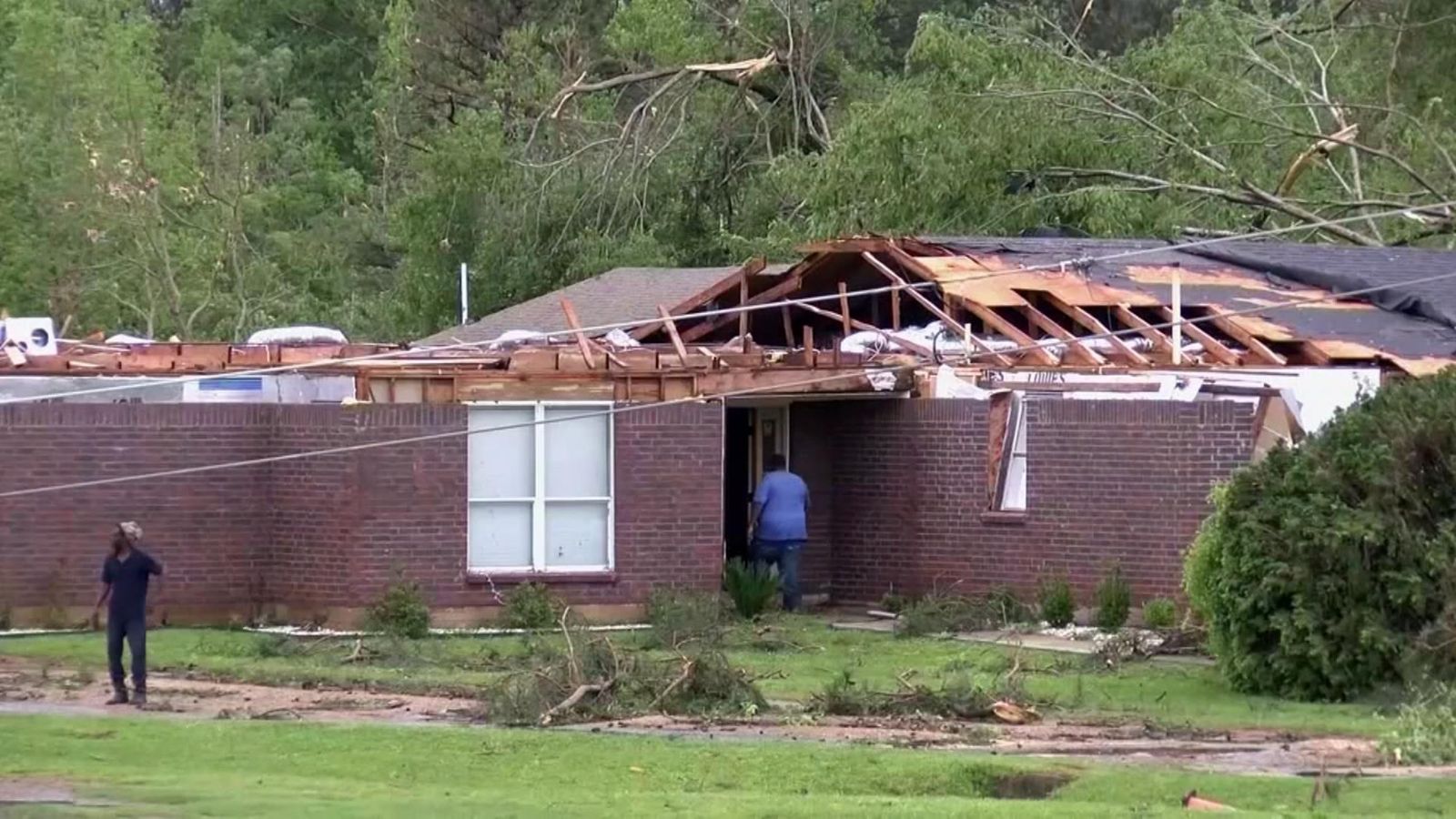 Tornadoes kill at least 30 people and damage hundreds of homes in
