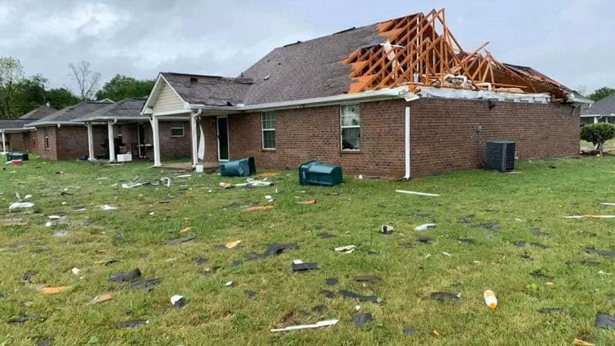 Tornadoes kill at least 30 people and damage hundreds of homes in