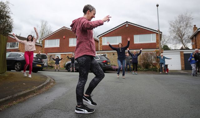 Coronavirus: Entire street joins together for 'socially-distant' dancing outside homes