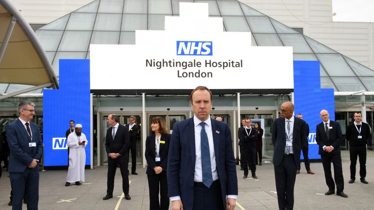 Britain's Health Secretary Matt Hancock prepares for the opening of the "NHS Nightingale" field hospital, created at the ExCeL London exhibition centre, in London on April 3, 2020, to help with the novel coronavirus COVID-19 pandemic. - The new state-run National Health Service (NHS) hospital, named after trailblazing 19th-century nurse Florence Nightingale, has been built in just nine days. (Photo by Stefan Rousseau / POOL / AFP) (Photo by STEFAN ROUSSEAU/POOL/AFP via Getty Images)