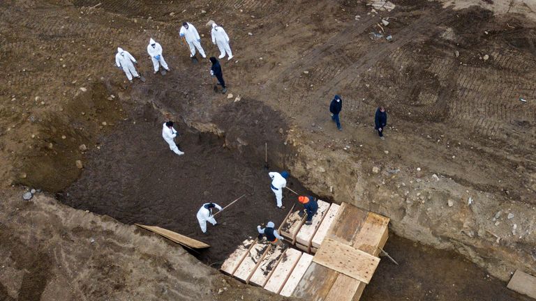 Drone pictures show bodies being buried on New York's Hart Island where the department of corrections is dealing with more burials overall, amid the coronavirus disease (COVID-19) outbreak in New York City, U.S., April 9, 2020. REUTERS/Lucas Jackson