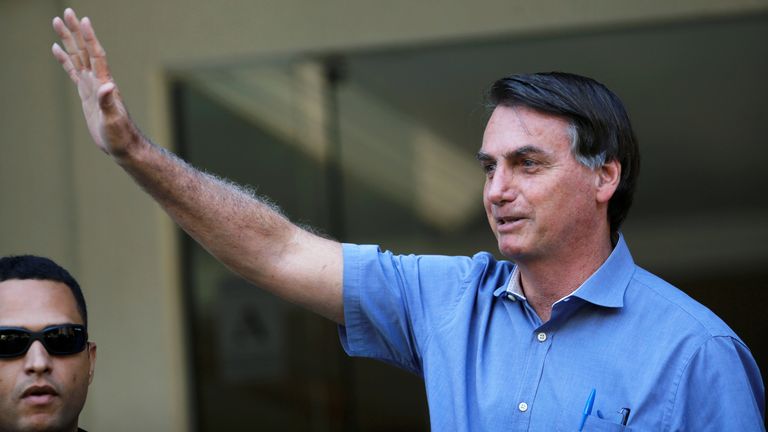 Brazil&#39;s President Jair Bolsonaro is seen in a neighborhood Sudoeste, amid the coronavirus disease (COVID-19) outbreak, in Brasilia, Brazil, April 10, 2020. REUTERS/Adriano Machado