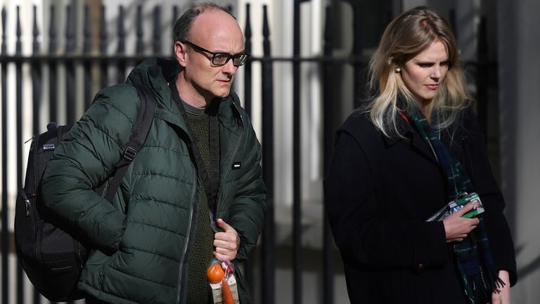 Number 10 special advisor Dominic Cummings (L) arrives with Cleo Watson at 10 Downing Street in central London to attend the Government&#39;s daily COVID-19 briefing on April 14, 2020. - The British government warned Monday it would not be lifting a nationwide lockdown anytime soon as the country remains in the grip of a coronavirus outbreak that has claimed more than 11,000 lives. (Photo by JUSTIN TALLIS / AFP) (Photo by JUSTIN TALLIS/AFP via Getty Images)