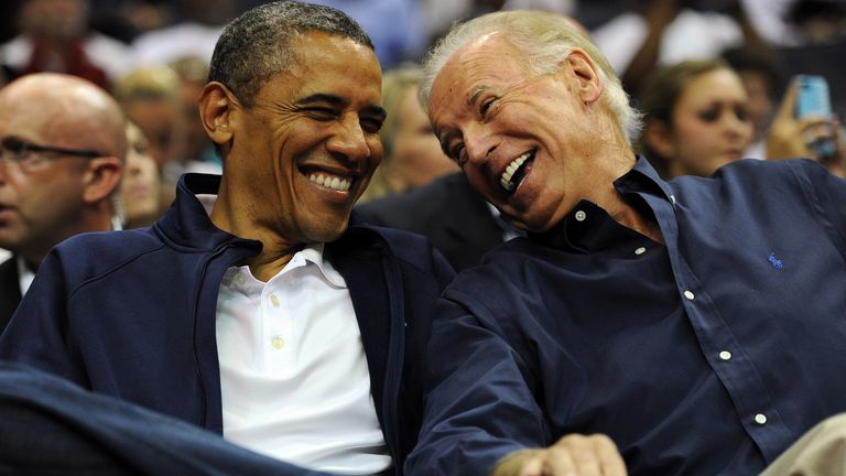 WASHINGTON, DC - JULY 16: U.S. President Barack Obama and Vice President Joe Biden share a laugh as the US Senior Men's National Team and Brazil play during a pre-Olympic exhibition basketball game at the Verizon Center on July 16, 2012 in Washington, DC. (Photo by Patrick Smith/Getty Images)