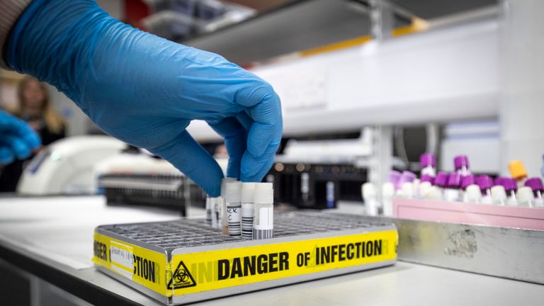 GLASGOW, SCOTLAND - FEBRUARY 19: Clinical support technician Douglas Condie extracts viruses from swab samples so that the genetic structure of a virus can be analysed and identified in the coronavirus testing laboratory at Glasgow Royal Infirmary, on February 19, 2020 in Glasgow, Scotland. (Photo by Jane Barlow - WPA Pool/Getty Images)