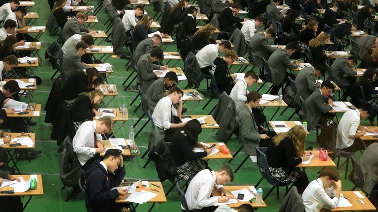 File photo dated 09/01/17 of students sitting their exams. Figures released from Ofqual show that the number of students penalised for cheating in exams has risen by 11% when compared to last year.