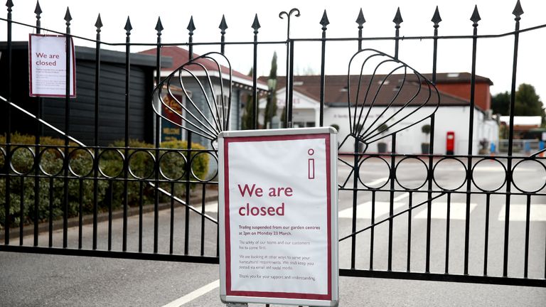 A sign in front of closed gates at Squire's Garden Centre in Farnham, Surrey as the UK continues in lockdown to help curb the spread of the coronavirus.