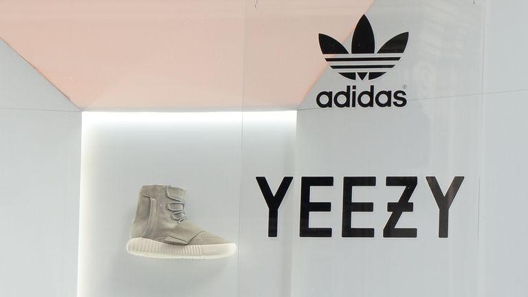 A single 'Yeezy' sneaker is seen in a window in Soho, New York City 