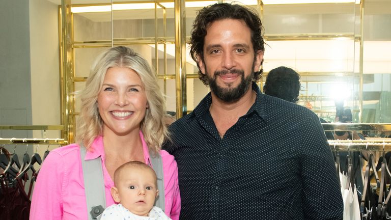 Nick Cordero and his wife Amanda Kloots with their baby son Elvis last summer