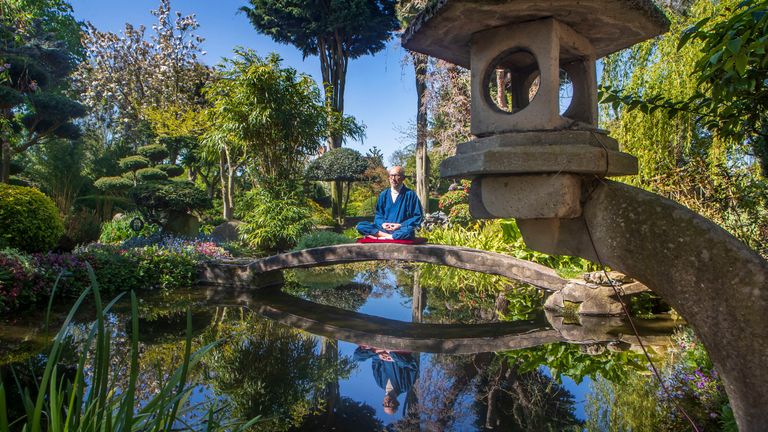 Former Buddhist monk Buddha Maitreya, in his award-winning Japanese garden at the Pure Land Meditation Centre in Nottinghamshire