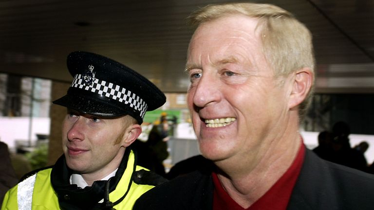 Gameshow host Chris Tarrant (L) arrives at Southwark Crown Court March 12, 2003 in London, United Kingdom. Tarrant was giving evidence in the case involving Charles Ingram who has been charged with deception and conspiracy after he and his wife Diana, and a business lecturer, Tecwen Whittock allegedly cheated to win the jackpot on the television quiz show &#39;Who Wants to be a Millionaire?&#39;