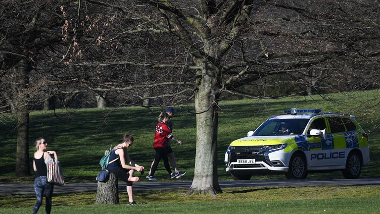 LONDON, ENGLAND - APRIL 05: A police car is seen patrolling Greenwich Park on April 5, 2020 in London, England . The Coronavirus (COVID-19) pandemic has spread to many countries across the world, claiming over 60,000 lives and infecting over 1 million people. (Photo by Peter Summers/Getty Images) 