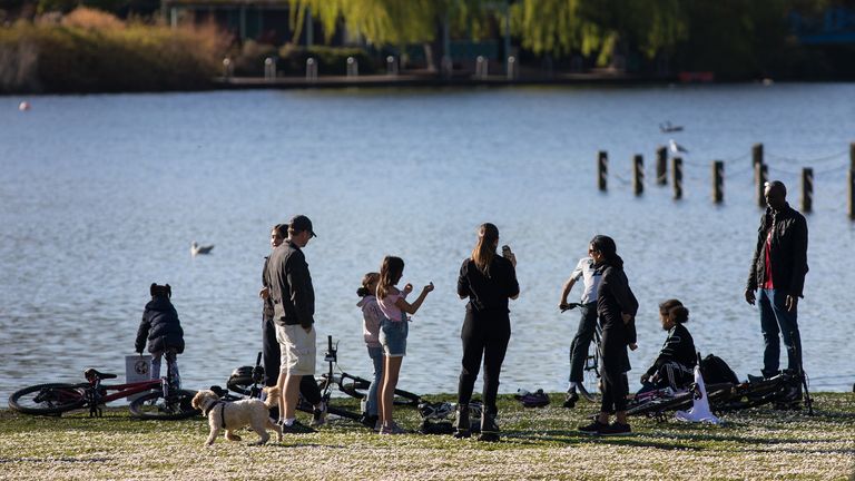 LONDON, ENGLAND - APRIL 04: People are seen by the lake in Regents Park on April 04, 2020 in London, England. The Coronavirus (COVID-19) pandemic has spread to many countries across the world, claiming over 60,000 lives and infecting over 1 million people. (Photo by Jo Hale/Getty Images)
