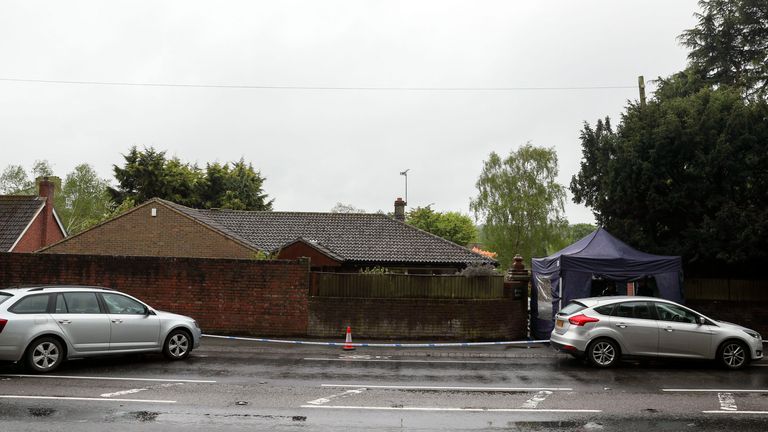 The home in Godstone has been cordoned off by police