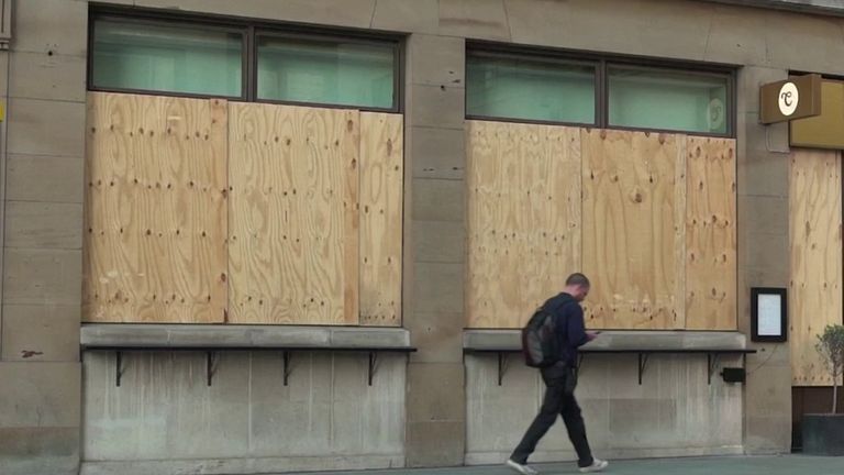 Boarded up shop on high street - economy