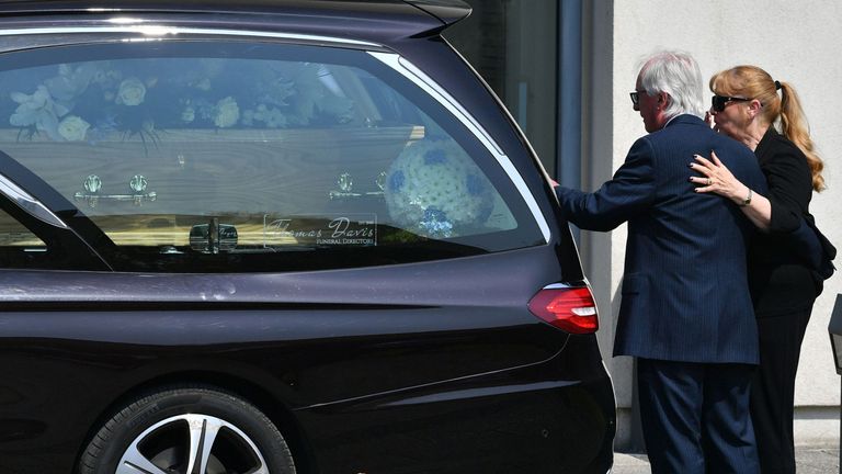 Syd Little and his wife, Sheree, pay their last respects to his comedy legend partner Eddie Large, before his funeral