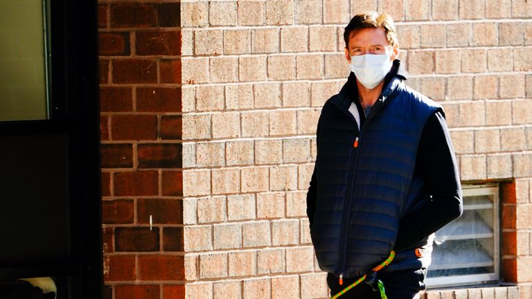 Hugh takes the dog for a walk during lockdown in New York