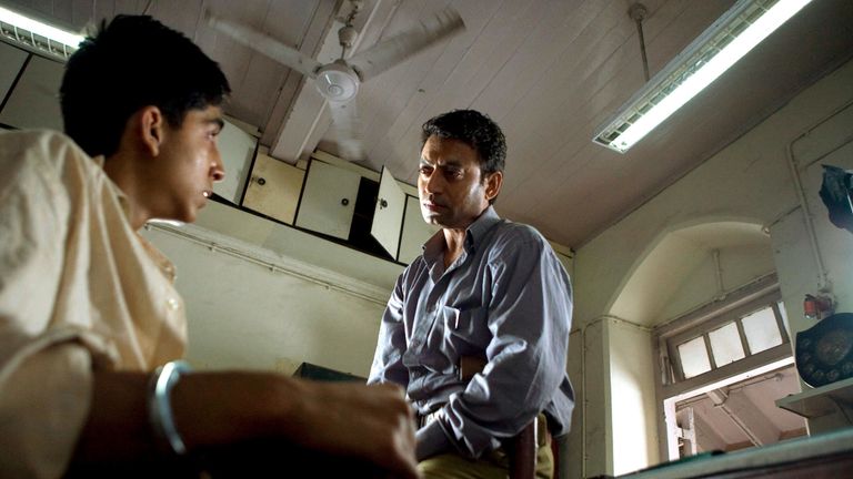 Dev Patel and Irrfan Khan in Slumdog Millionaire. Pic: Celador Films/Pathe International/Kobal/Shutterstock