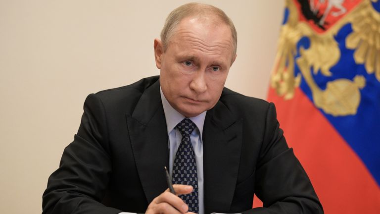 Vladimir Putin chairs a meeting via a video link amid the coronavirus pandemic