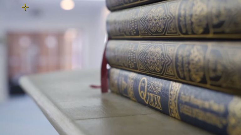 Copies of the Quran are seen stacked inside the Birmingham mosque