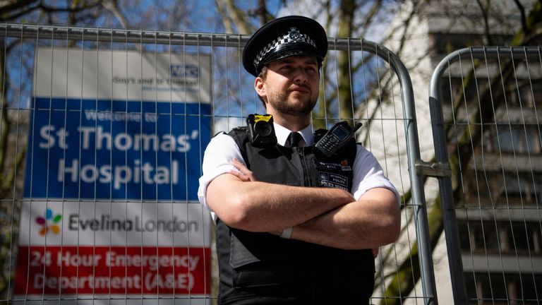 A police officer stands guard outside St Thomas&#39; Hospital
