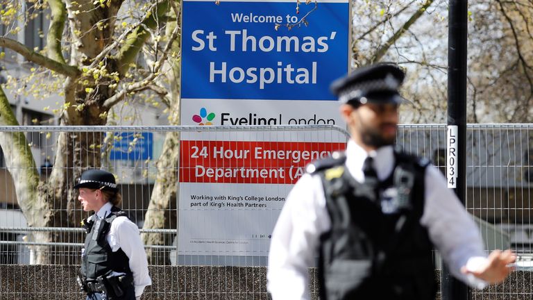 Police stand guard outside St Thomas&#39; Hospital in London, where Boris Johnson is being treated