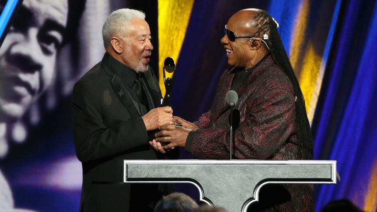 Bill Withers and Stevie Wonder on stage during the 30th Annual Rock And Roll Hall Of Fame Induction Ceremony  at Public Hall on April 18, 2015 in Cleveland, Ohio.