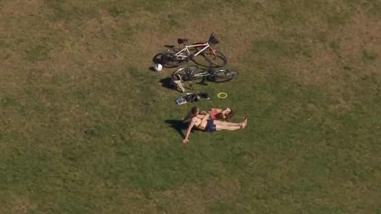 Aerial footage has shown some Londoners sunbathing, despite social distancing advice.