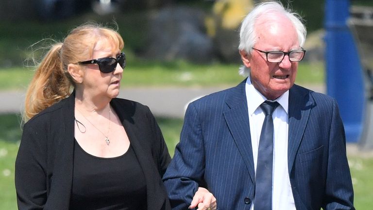 Syd Little and his wife, Sheree, arrive to see the hearse carrying Eddie Large&#39;s coffin 