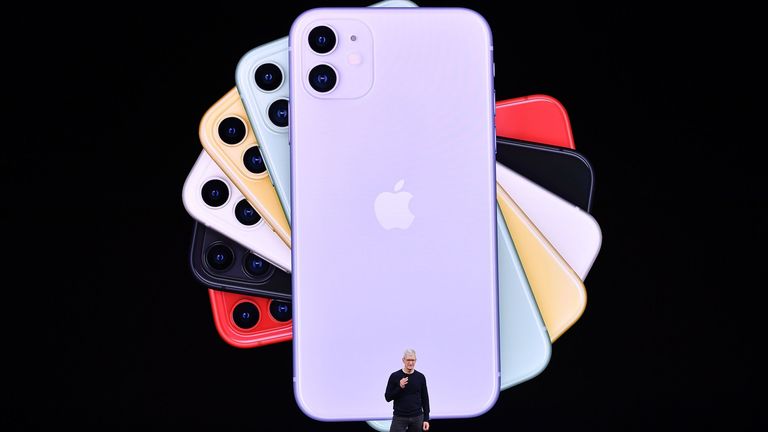 Apple CEO Tim Cook speaks on-stage during a product launch event