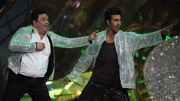 Kapoor performs with his son Ranbir at an awards ceremony in 2012