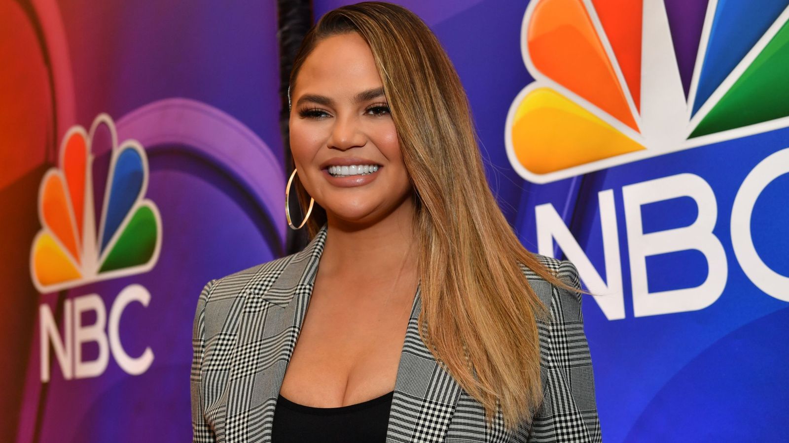 Chrissy Teigen announces breast implant removal after COVID19 test