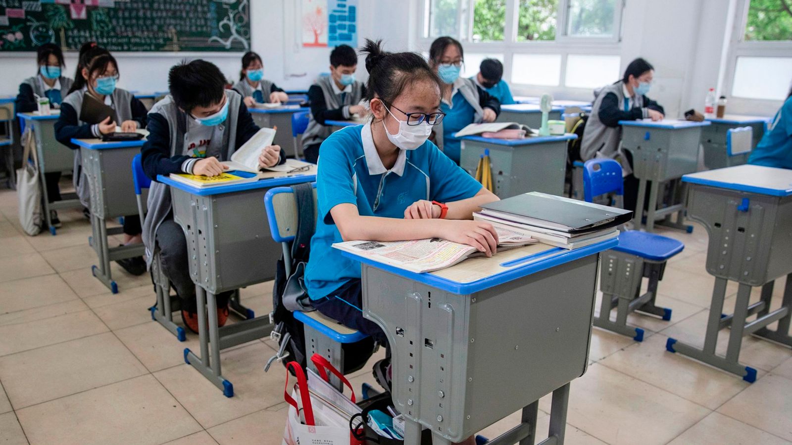 Coronavirus: Schools reopen in Chinese city where pandemic began ...