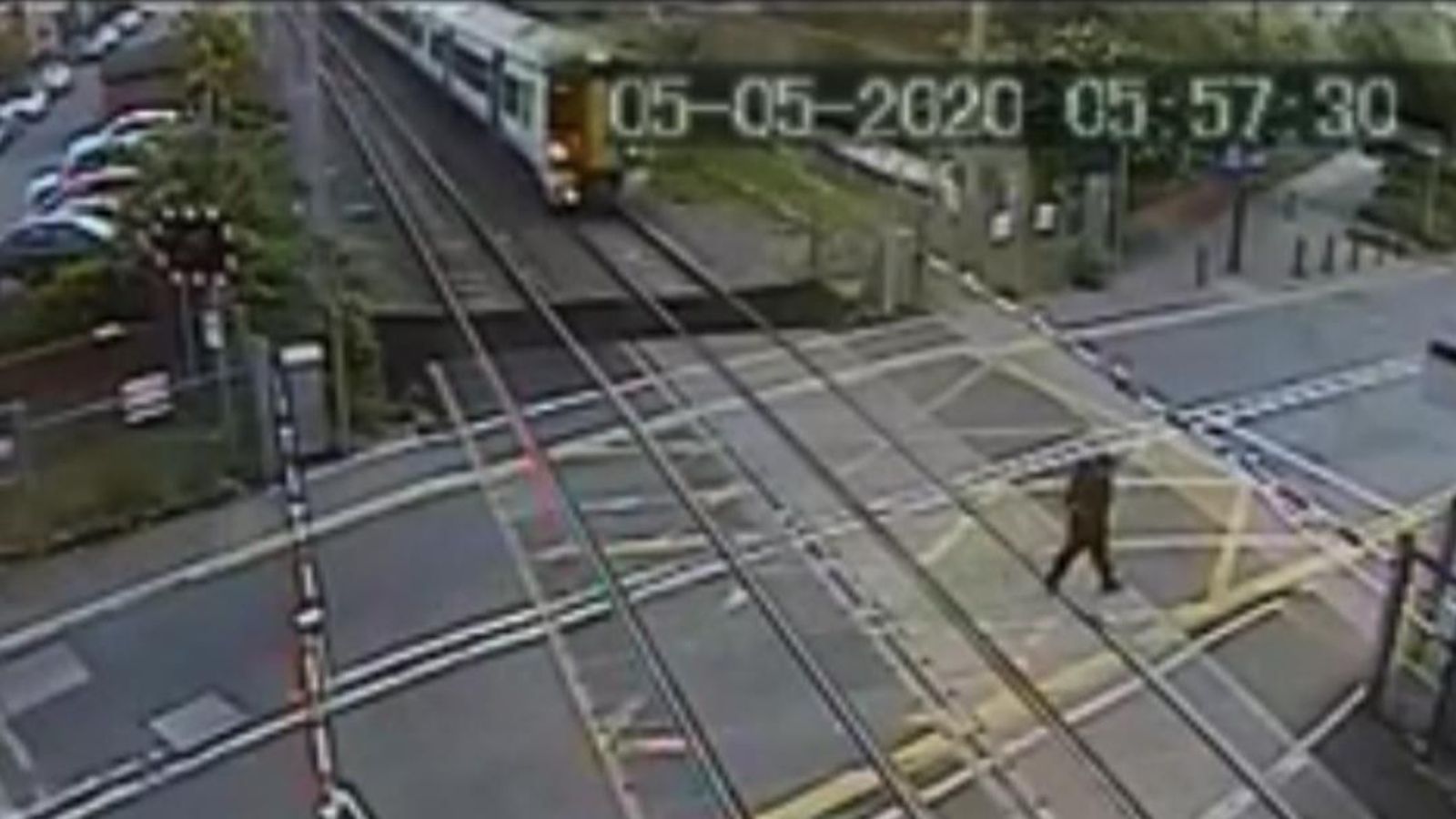 London: Man in near miss on level crossing | UK News | Sky News
