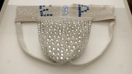 The rhinestone-studded jockstrap was made for Elvis by a fan and he is believed to have worn it several times