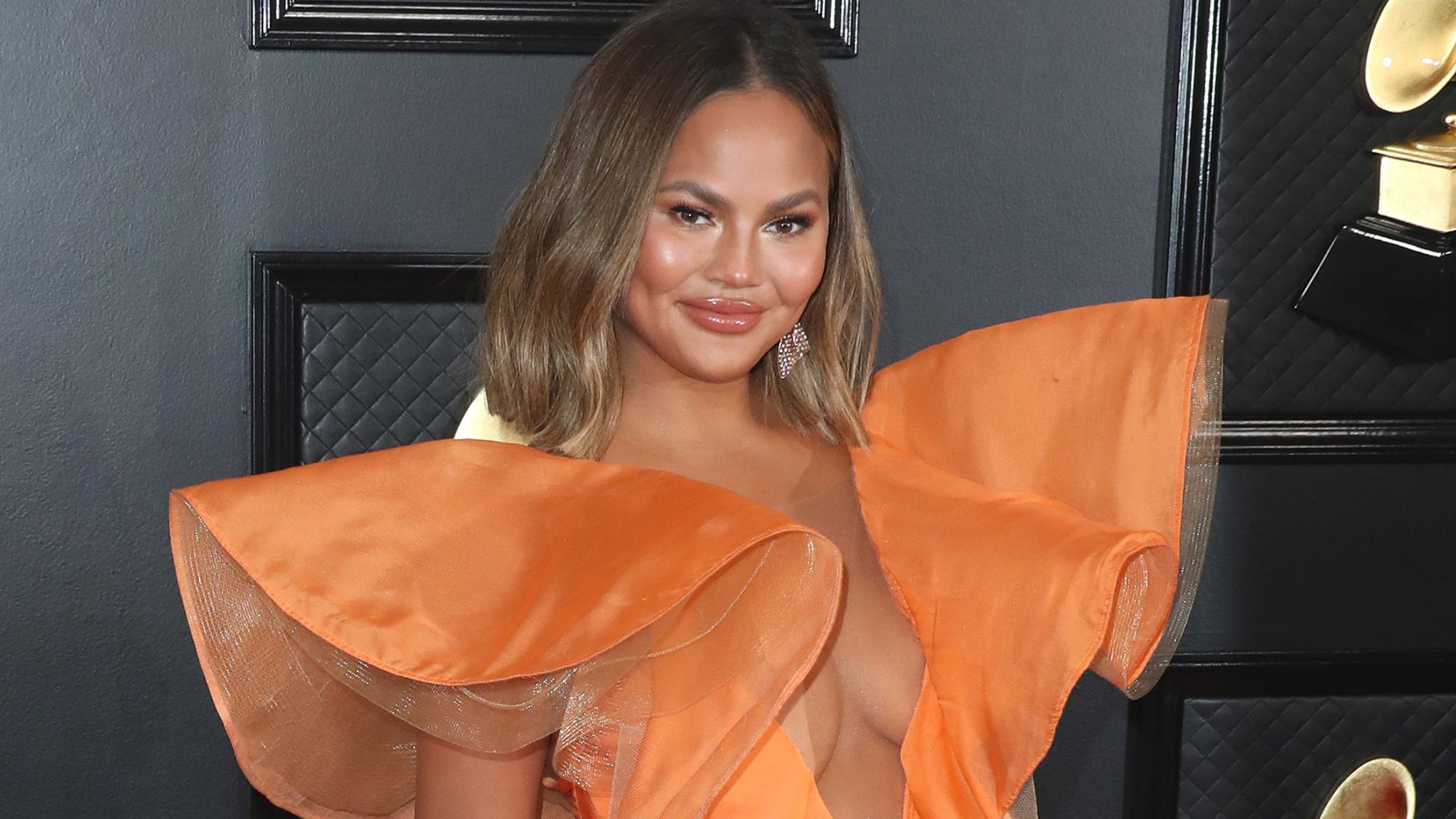 Chrissy Teigen announces breast implant removal after COVID-19