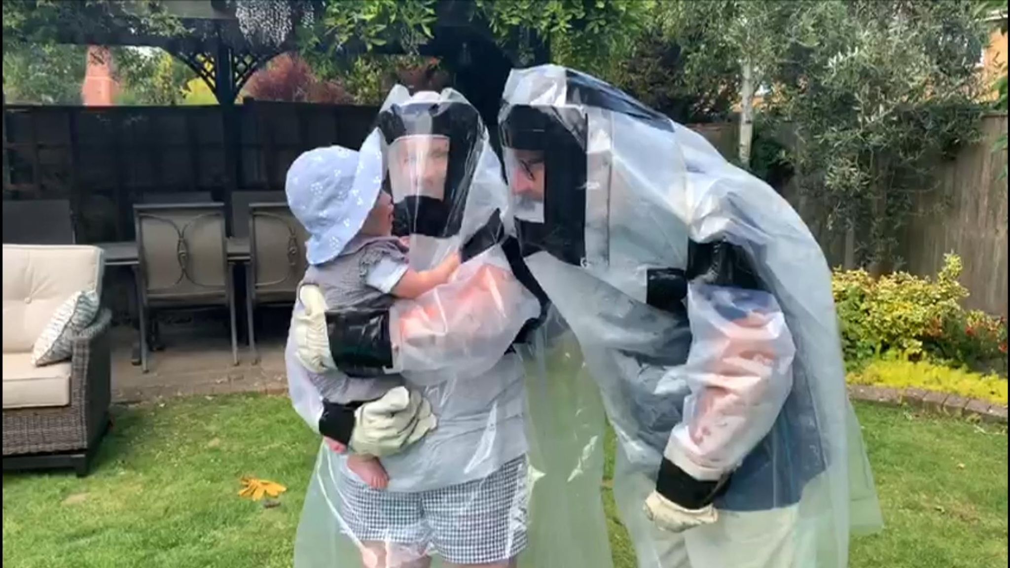 Coronavirus Grandparents in DIY hazmats hug granddaughter  UK News  Sky  News
