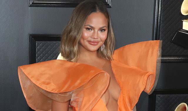 Chrissy Teigen announces breast implant removal after COVID-19 test